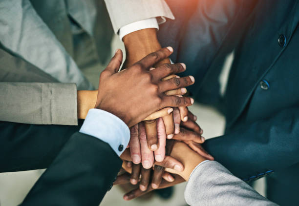 istock Business people, hands and collaboration of teamwork with support, celebration and corporate success. Office, professional and lawyer group with solidarity of workforce with motivation from above 2160097971