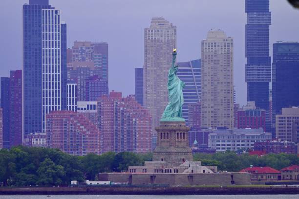 Statue of Liberty with Manhattan and New Jersey as a background
