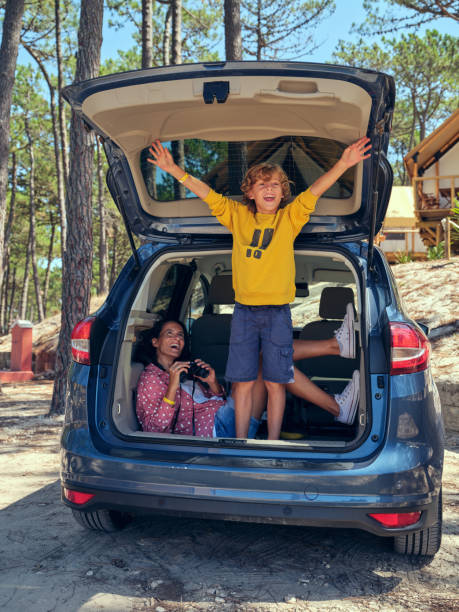 istock Laughing mother and son on summer road trip 2160111109
