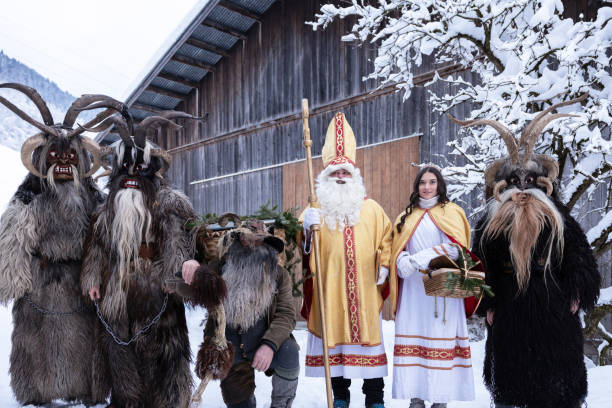 istock Traditional Austrian Krampus and Saint Nicholas Characters in Winter 2160111519