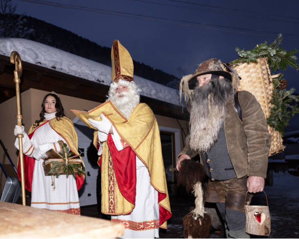 istock Saint Nicholas, Krampus, and Angel Procession in the Austrian Alps During Winter 2160111668