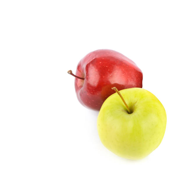 Concept of eco food, vitamins and vegetarian lifestyle: colorful apples isolated on bright green background