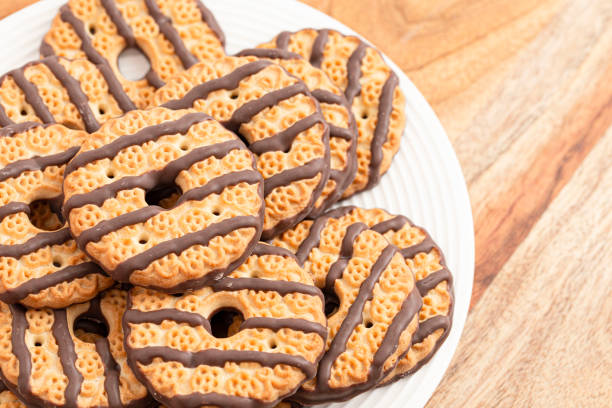 Fudge Striped Shortbreak Cookies on a Wooden Kitchen Table