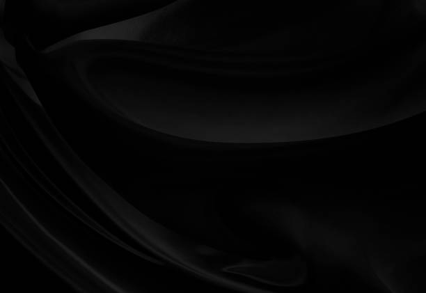 istock Black gray satin dark fabric texture luxurious shiny that is abstract silk cloth background with patterns soft waves blur beautiful. 2160119599