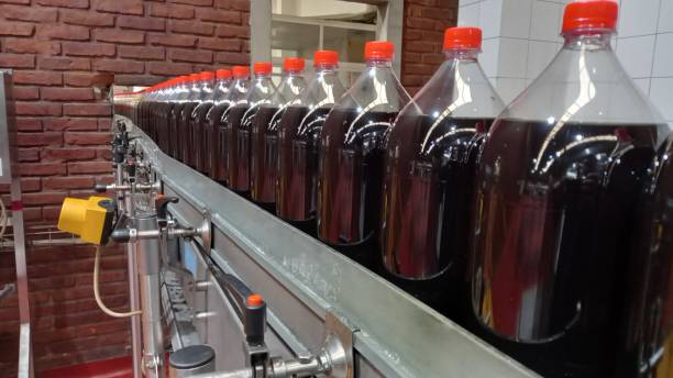 soda factory Beverage manufacturing process. intentional blur.