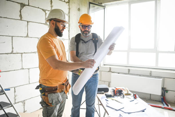 istock workers are doing repairs in the apartment 2160124513