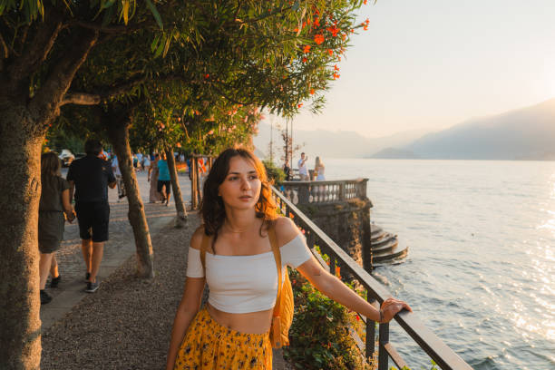 istock Woman on vacation at lake Como exploring old town 2160128545