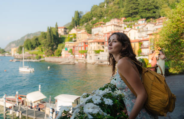 istock Woman exploring Bellagio at lake Como  in summer 2160128829
