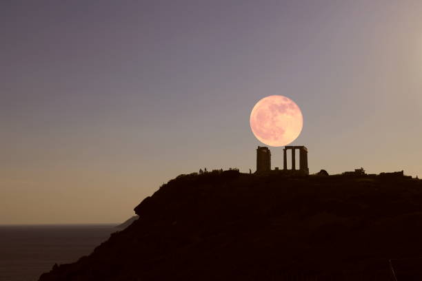 istock Moonrise over the Poseidon Temple 2160134074