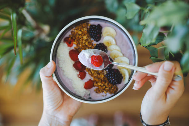 istock Smoothie bowl with fresh berries and granola 2160142912