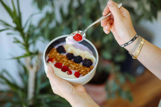 istock Smoothie bowl with fresh berries and granola 2160143463