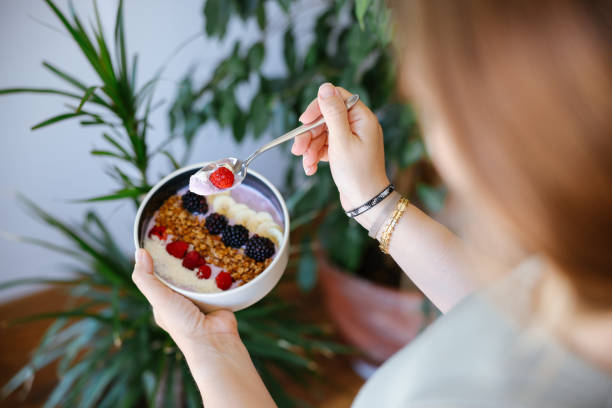 istock Smoothie bowl with fresh berries and granola 2160143519