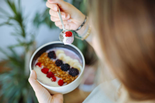 Smoothie bowl with fresh berries and granola