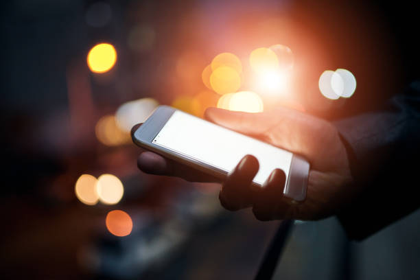 istock Hands, business person and cellphone screen for communication, networking and connection. Bokeh, internet and online on news website for updates, post and mobile app with mockup space and lens flare 2160149311