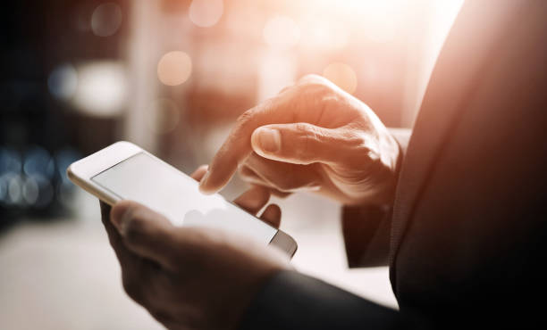 istock Hands, business person and smartphone screen for communication, networking and connection. Mockup space, internet and online on news website for updates, report and economy with mobile app and text 2160149312