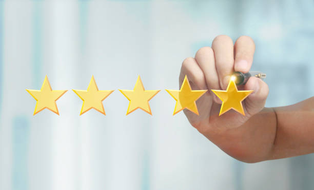 istock Rise on increasing five stars in human hand 2160150206