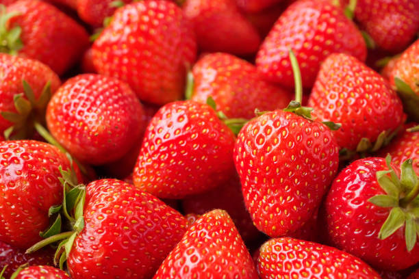 istock Fresh organic red strawberry fruit background 2160152761