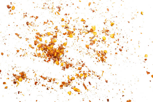 istock dried red chili pepper flakes and seeds isolated on white background 2160153076