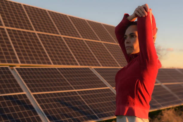 istock women exercising outdoors next to solar panels 2160154924