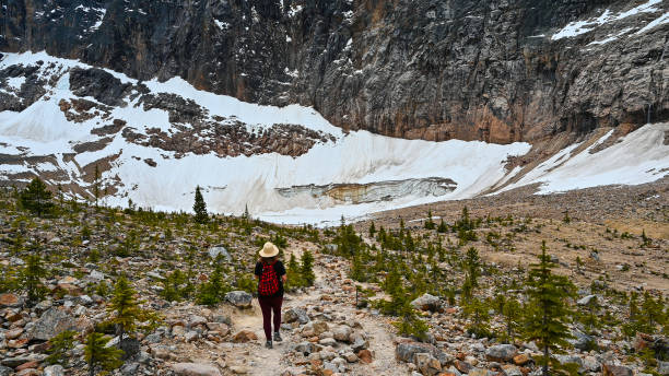 Young girl Hiking in Edith Cavell trail in jasper, in the Canadian Rocky Mountains