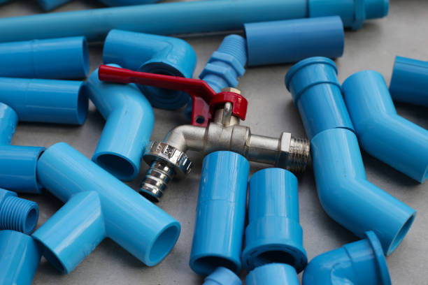 istock Plumber equipment with blue pvc pipe connections for plumbing work. 2160159326