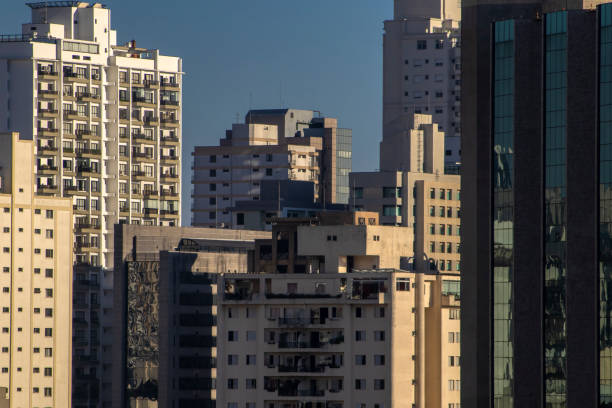 Sao Paulo, Brazil, January 14,2024. The exterior of modern condominiums is used full of glass, including sliding doors, windows and balconies. to avoid feeling cramped in Sao Paulo city