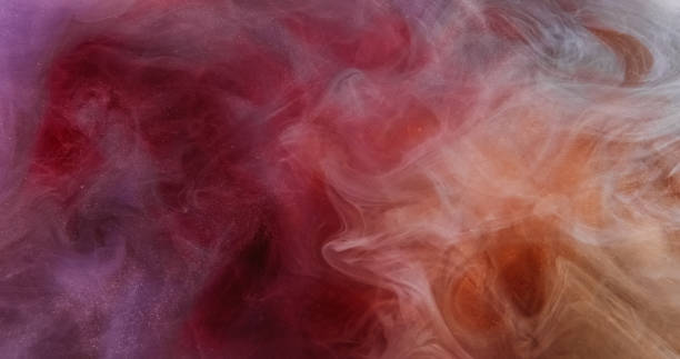 istock Smoke twist sparkling haze pink background motion 2160171854
