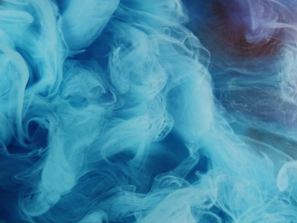 istock Twisted steam colorful smoke cloud blue glitter 2160172220