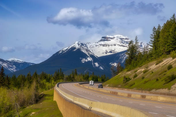 istock Summer Road Through The Banff Mountains 2160172736