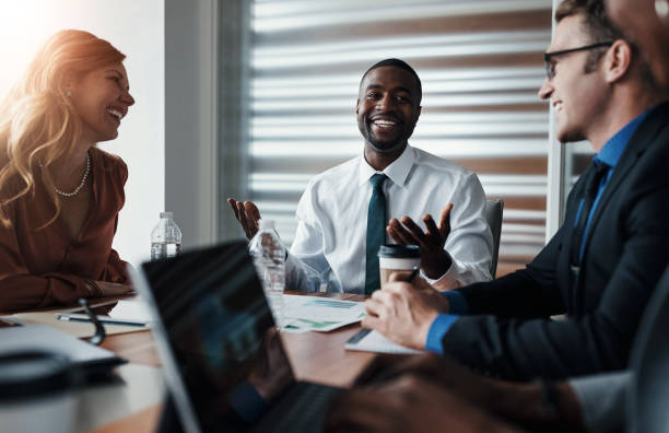 istock Business people, meeting and teamwork with documents, paperwork or data analytics of financial report and stats. Investor, clients and b2b leader talking with advice or pitch for company investment 2160173120
