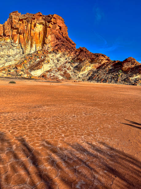 istock Claypan in front of rock formation - Australian Red centre landscape 2160173789