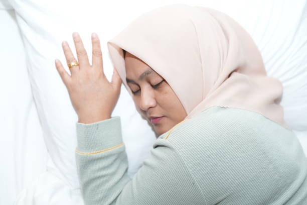 istock Muslim women doing activities in bed while relaxing 2160174812