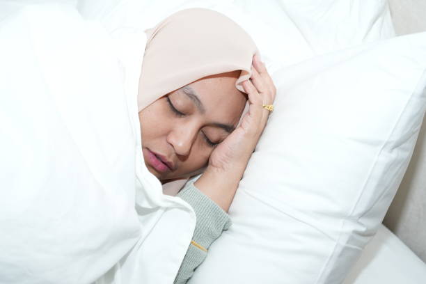 istock Muslim women doing activities in bed while relaxing 2160175016