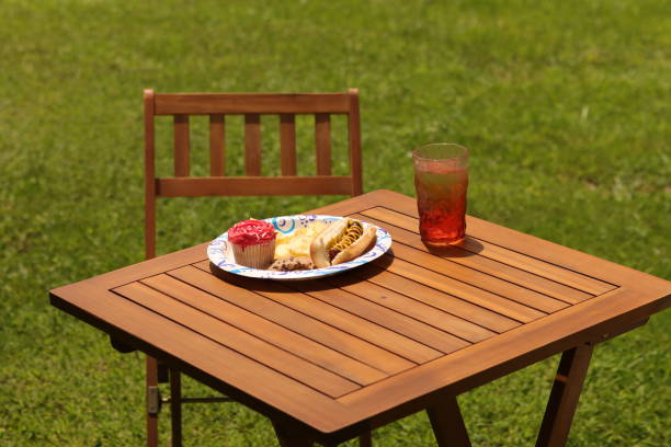 istock Outdoor picnic table with food and drink 2160175324