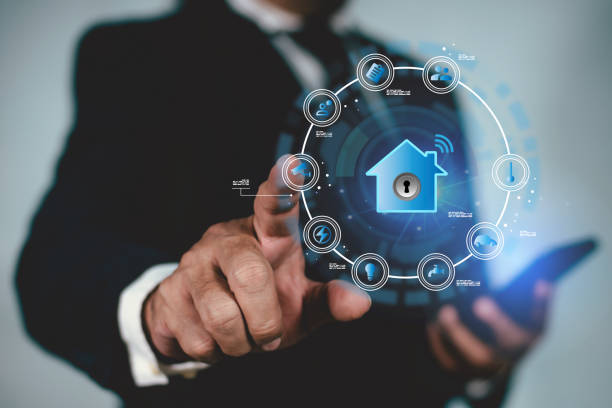 istock Smart home digital remote control on smartphone concept. internet of things in technology control. Businessman touching house with virtual smart home icon function. 2160176657