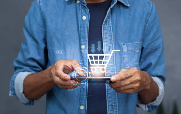 istock smartphone with application online shopping platform and shopping cart icon 2160176796