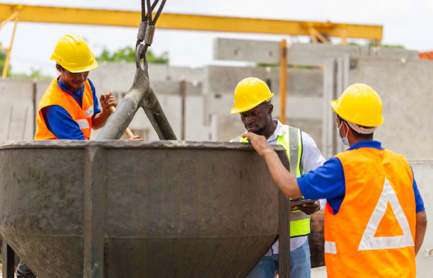 istock Construction workers at work, Foreman and worker team discussing at precast concrete factory site 2160185696