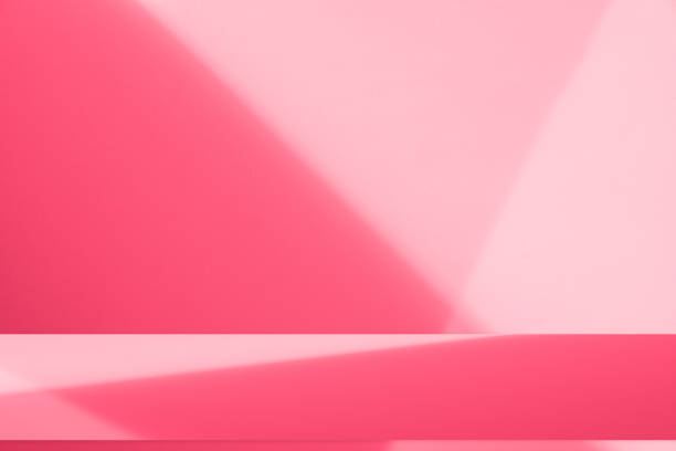 istock Wall interior background, studio, and backdrops show products. with shadow from window color white and pink light. background for text insertion and presentation of product 2160186650