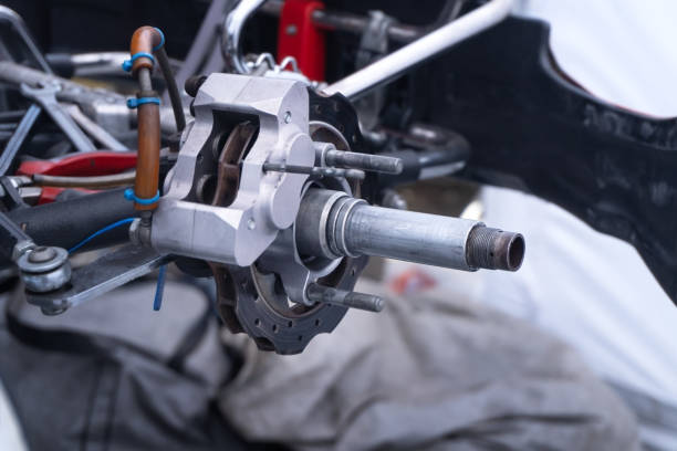 istock changing a wheel on a racing car 2160189250