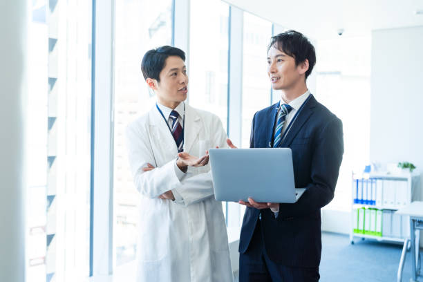 istock Businessman having a meeting with a doctor 2160193048