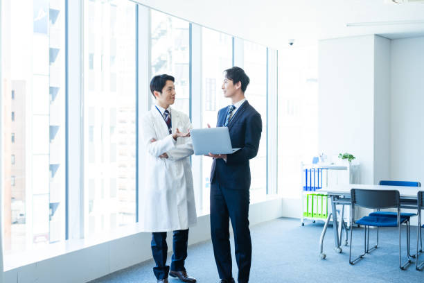 istock Businessman having a meeting with a doctor 2160193057
