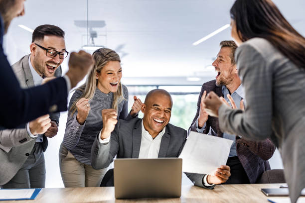 istock Celebrating good news in the office! 2160196661