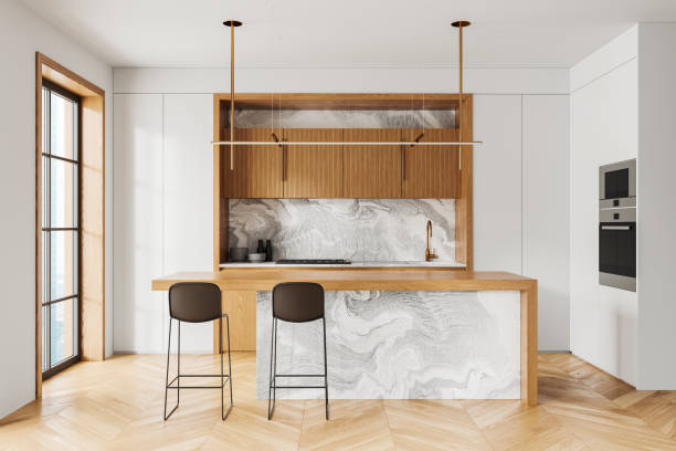 istock Modern kitchen with marble surfaces, wooden accents, light color scheme. Minimalist design. 3D Rendering. 2160199178
