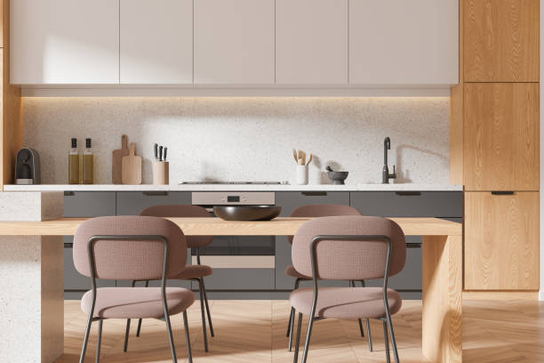 istock Luxury home kitchen interior with eating table and cabinet with kitchenware 2160199624