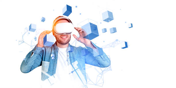 istock Young man in vr headset, blocks in metaverse. Copy space 2160199669