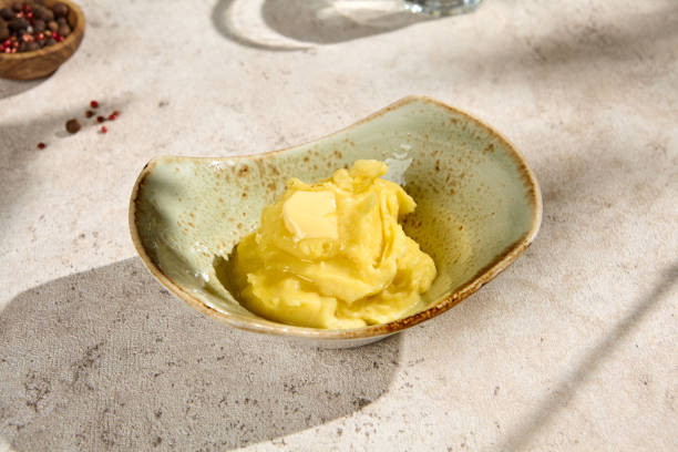 istock Creamy Mashed Potatoes with Butter in Sunlit Summer Shadows 2160200994