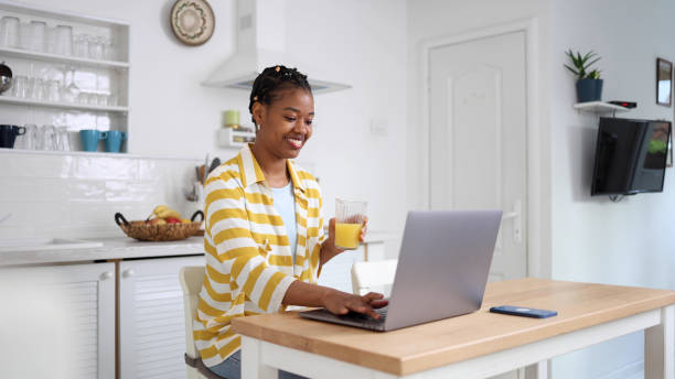 istock Happy young woman working online 2160203993