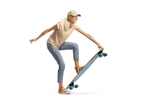 istock Cheerful young woman with a longboard 2160204028