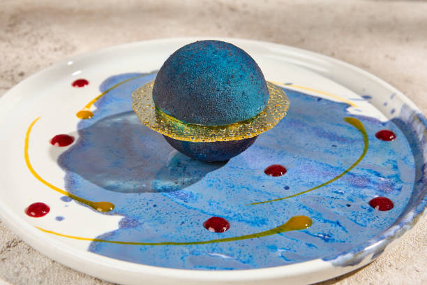 istock Galaxy-Inspired Mousse Pastry Planetary Dessert under Summer Sunlight with Shadows 2160204812
