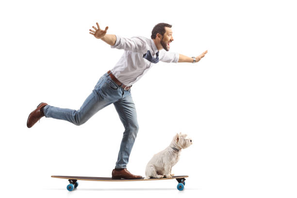 istock Businessman riding a skateboard with a dog 2160205063